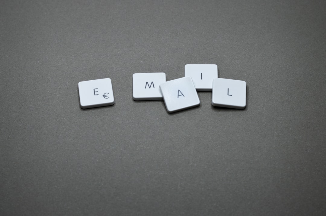 The word "email" is spelled out with letter tiles.